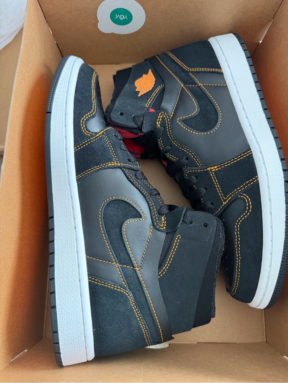 Nike Black High-Top Sneakers with Orange Stitching